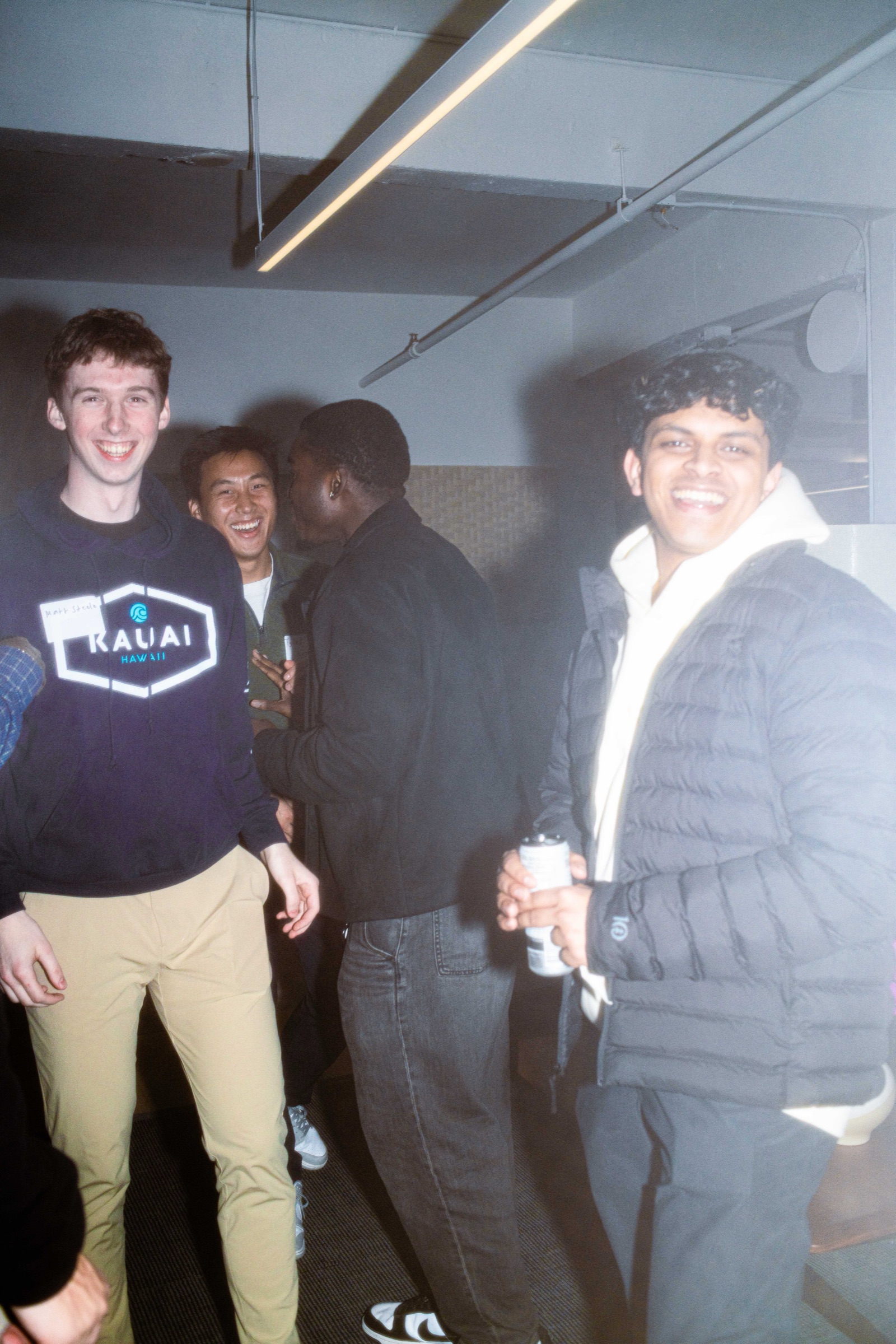 Cognition team members laughing at party